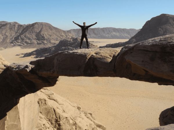 Burdah Bridge hike from Wadi Rum camp exploring desert rock formations in Wadi Rum